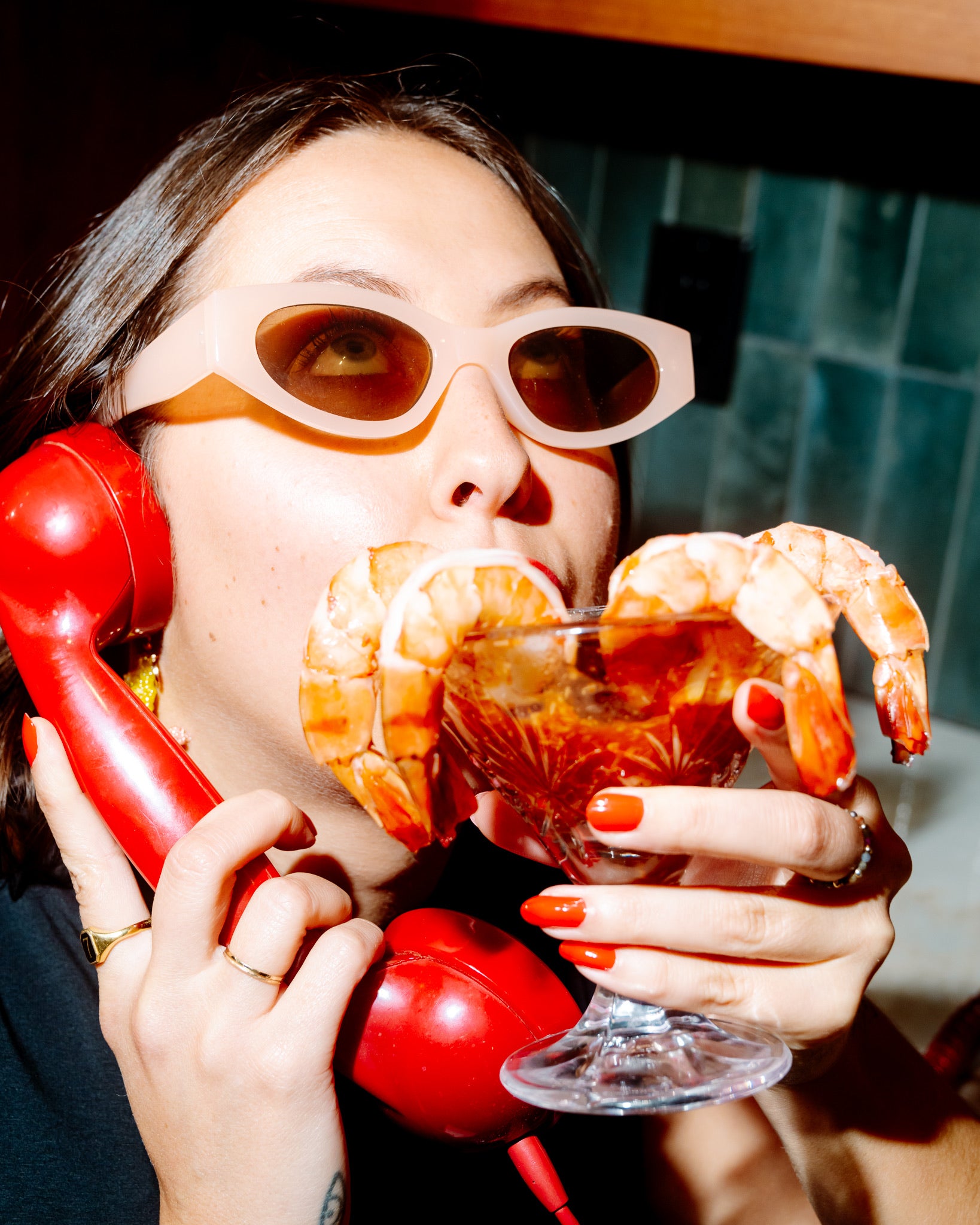 Woman holding a Black Tiger Shrimp cocktail